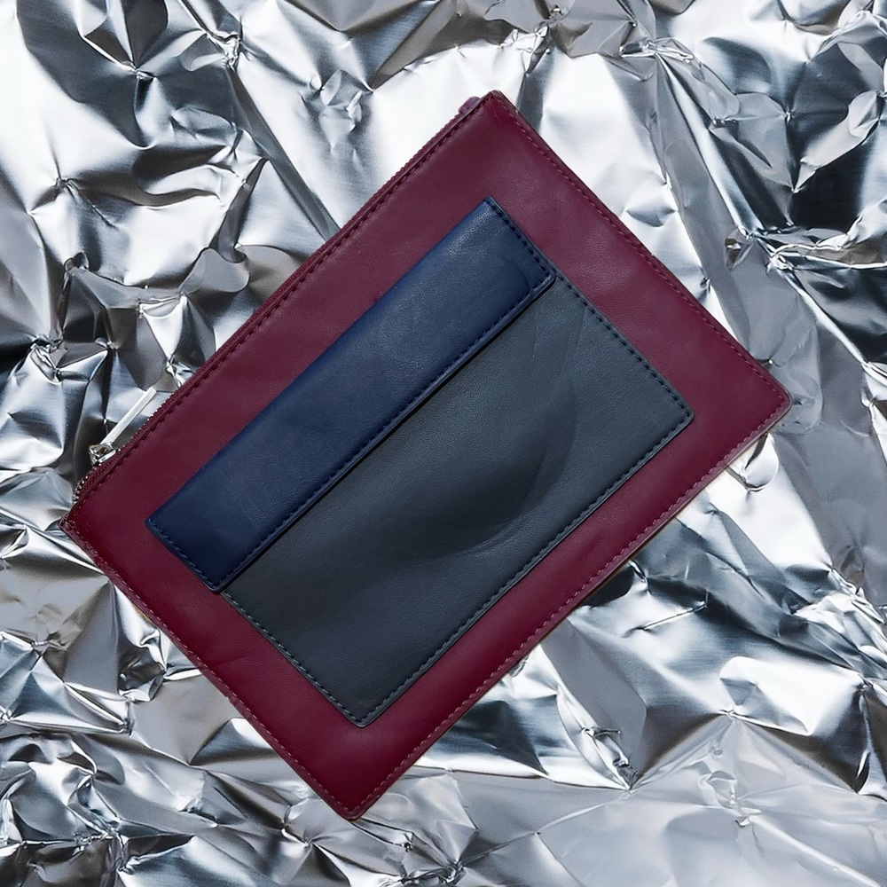 Mango purse in burgundy and dark blue.